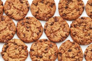 Full Frame Shot Of Chocolate Chip Cookie On White Background