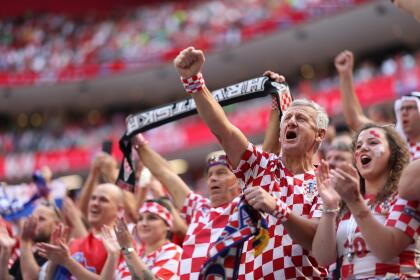 AL KHOR, QATAR - NOVEMBER 23: Fans of Coratia react during the FIFA World Cup Qatar 2022 Group F match between Morocco and Croatia at Al Bayt Stadium on November 23, 2022 in Al Khor, Qatar. (Photo by Lars Baron/Getty Images)