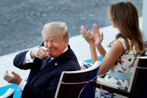 US President Donald Trump and First Lady Melania Trump attend the traditional Bastille Day military parade on the Champs-Elysees in Paris