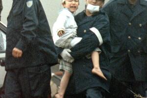 April 1995 file picture shows a child of a member