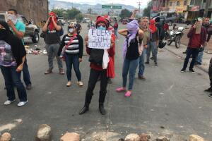 Honduran protester 'Fuera JOH'