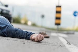 Traffic accident.Young man hit by a car