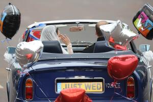 Britain's Prince William drives an Aston