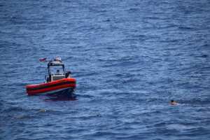Coast Guard Cutter Resolute rescues eight people from the water about 16 miles south of Key West, Florida, May 27,2021