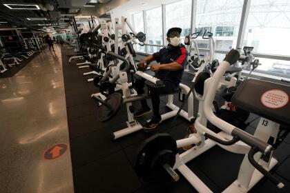 Wesley Thomas works out at Fitness SF Transbay during the coronavirus outbreak in San Francisco, Tuesday, Sept. 15, 2020. (AP Photo/Jeff Chiu)