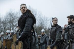 Alexander Dreymon as Uhtred, Arnas Fedaravicius as Sihtric and Mark Rowley as Finan in The Last Kingdom Seven Kings Must Die. Cr. Courtesy of Netflix.jpg