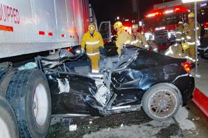 Trapped under truck