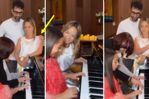 Adamari López y Toni Costa abrazados