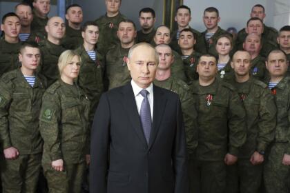 President Vladimir Putin speaks in a recording of his annual televised New Year's message on New Year's Eve after an awarding ceremony during his visit to the headquarters of the Southern Military District, at an unknown location in Russia, Saturday, Dec. 31, 2022. (Mikhail Klimentyev, Sputnik, Kremlin Pool Photo via AP)