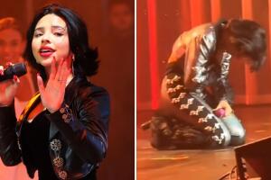 Ángela Aguilar se arrodilla frente al público