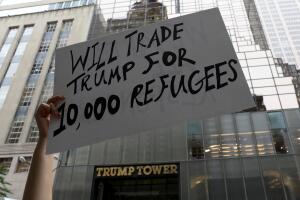 A protester walks outside Trump Tower in New York