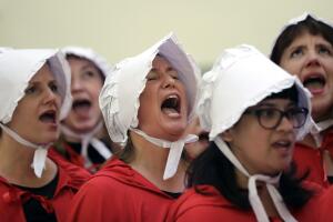 salud obamacare protestas mujeres rojo