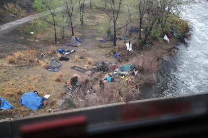 DENVER, CO - MARCH 24: A homeless encampment is seen as Amtrak's California Zephyr pulls out of the Denver Union rail station during its daily 2,438-mile trip to Emeryville/San Francisco from Chicago that takes roughly 52 hours on March 24, 2017 in Denver, United States. President Trump has proposed a national budget that would terminate federal support for Amtrak's long distance train services, which would affect the California Zephyr and other long distance rail lines run by Amtrak. (Photo by Joe Raedle/Getty Images)