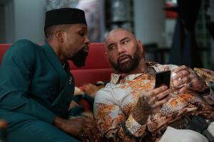 Leslie Odom Jr. as Lionel, and Dave Bautista as Duke. Cr. John Wilson Netflix.jpg