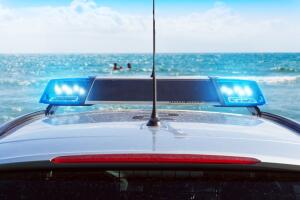 police patrol car on the beach