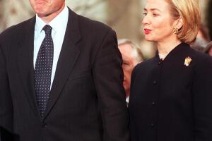 US President Bill Clinton stands with his wife Hil
