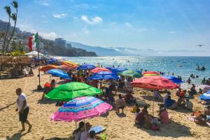 crowded colorful peurto vallarta tropical mexican beach