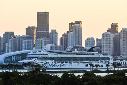 A docked Norwegian Gem cruise ship is seen at the Port of Miami in Miami Beach, Florida on April 14, 2021. - After more than a year of frustration, diehard fans of cruise vacations at last sense an end to their Covid-imposed stranding, and many are booking trips as soon as they can. (Photo by CHANDAN KHANNA / AFP) (Photo by CHANDAN KHANNA/AFP via Getty Images)
