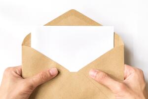 hand opening brown Document Envelope with copy space