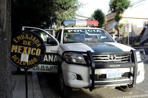 A police patrol vehicle is seen next to Mexico's embassy in La Paz