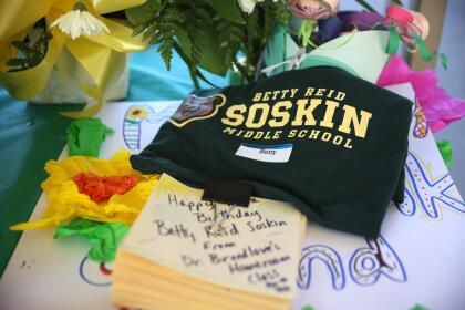 EL SOBRANTE, CALIFORNIA - SEPTEMBER 22: A t-shirt and happy birthday cards sit on a table for Betty Reid Soskin, the oldest full-time National Park Service ranger in the United States, during a ceremony for the newly renamed Betty Reid Soskin Middle School on September 22, 2021 in El Sobrante, California. Soskin had the school renamed after her on her 100th birthday. She currently works at the Rosie the Riveter/World War II Home Front National Historical Park where she leads tours, speaks to groups and answers questions about living and working in the area during World War Two. Soskin worked as a clerk for the Boilermakers A-36 in Richmond, California during the war. (Photo by Justin Sullivan/Getty Images)