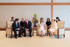 U.S. President Donald Trump talks with Japan's Emperor Naruhito while first lady Melania Trump talks with Empress Masako during their state call at the Imperial Palace in Tokyo