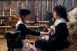 Jenna Ortega as Wednesday Addams, Moosa Mostafa as Eugene Otinger in episode 103 of Wednesday. Cr. Vlad Cioplea Netflix (1).jpg