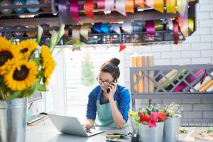 Young Businesswoman in Flower Shop