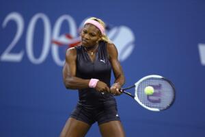 Serena Williams returns a shot 