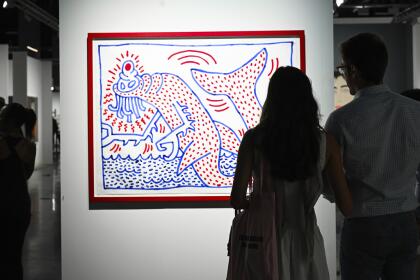 Artwork by Keith Haring is seen on display at day 2 of Art Basel on Thursday, Dec. 5, 2024, at Miami Beach Convention Center in Miami Beach. (Photo by Scott Roth/Invision/AP)