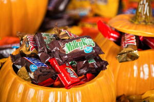 Decorative pumpkins filled with Halloween candy