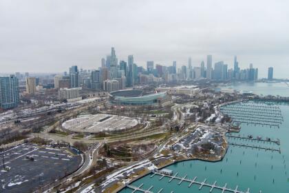 CHICAGO, ILLINOIS - JANUARY 03: In an aerial view from a drone, Soldier Field is seen with the Chicago skyline in the background before the game between the Green Bay Packers and the Chicago Bears at Burnham Harbor on January 03, 2021 in Chicago, Illinois. (Photo by Quinn Harris/Getty Images)
