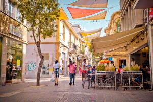 People enjoying a summer in cafes at Ledra street in central Nicosia, Cyprus.