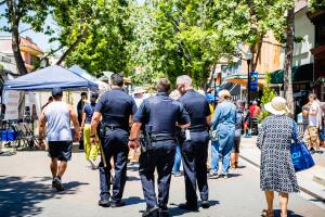 Police patrolling the streets of downtown Sunnyvale during the Art, Wine & Music Festival, California