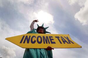Tax Preparers Work To Meet Tomorrow's Deadline