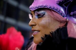 A participant takes part in the gay pride parade in La Paz