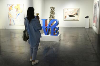 Various artwork is seen on display of day 2 at Art Basel on Thursday, Dec. 5, 2024, at Miami Beach Convention Center in Miami Beach. (Photo by Scott Roth/Invision/AP)