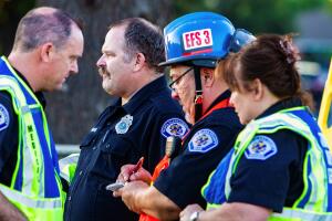Emergency personnel work at the scene of a mass shooting during the Gilroy Garlic Festival