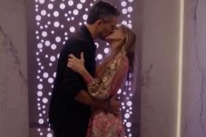 carrie-and-franklyn-kiss-1643932819632.jpg