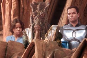 Temuera Morrison as Jango Fett, Daniel Logan as Boba Fett Grosby.jpg