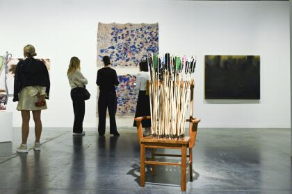 Various artwork is seen on display of day 2 at Art Basel on Thursday, Dec. 5, 2024, at Miami Beach Convention Center in Miami Beach. (Photo by Scott Roth/Invision/AP)