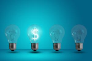 Money,Making,Idea.,Dollar,Symbol,Glow,Among,Other,Light,Bulb