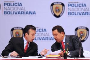 Tareck El Aissami con Chávez