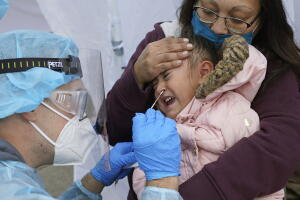 Virus Outbreak US Surge