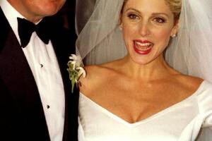 Donald Trump and Marla Maples appear in front of t