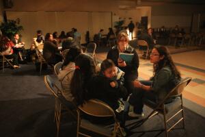 Immigration Outreach Group Passes Out "Know Your Rights Cards"