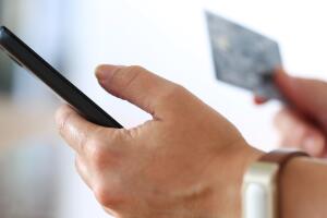 Female hands holding credit card