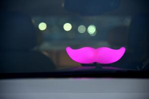 Lyft At Its San Francisco Headquarters Showcasing Lyft Cars, The Glowstache, The Lyft App, Lyft Passengers And Drivers