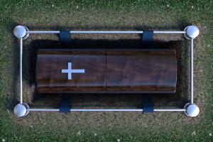 Modern Coffin Into Grave