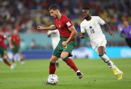 DOHA, QATAR - NOVEMBER 24: Ruben Dias of Portugal under pressure from Inaki Williams of Ghana during the FIFA World Cup Qatar 2022 Group H match between Portugal and Ghana at Stadium 974 on November 24, 2022 in Doha, Qatar. (Photo by Clive Brunskill/Getty Images)